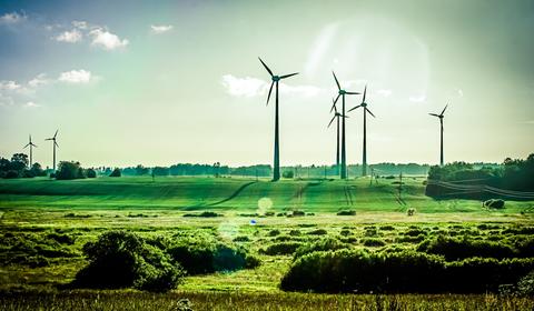 Field with wind turbine