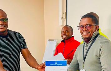 Colleague Recieving their certificate